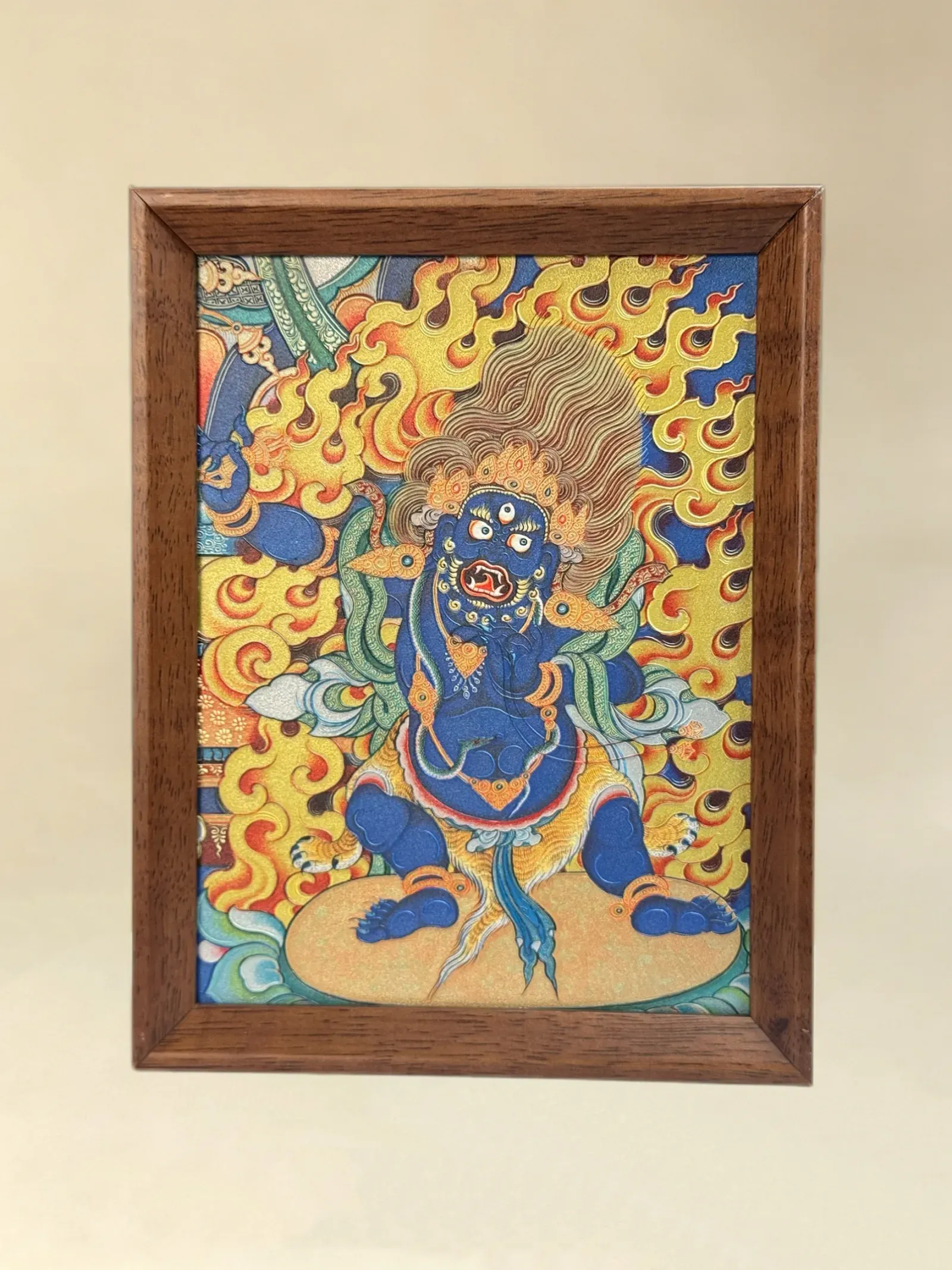 A relief artwork of Acala, as a desktop frame, photographed front on.