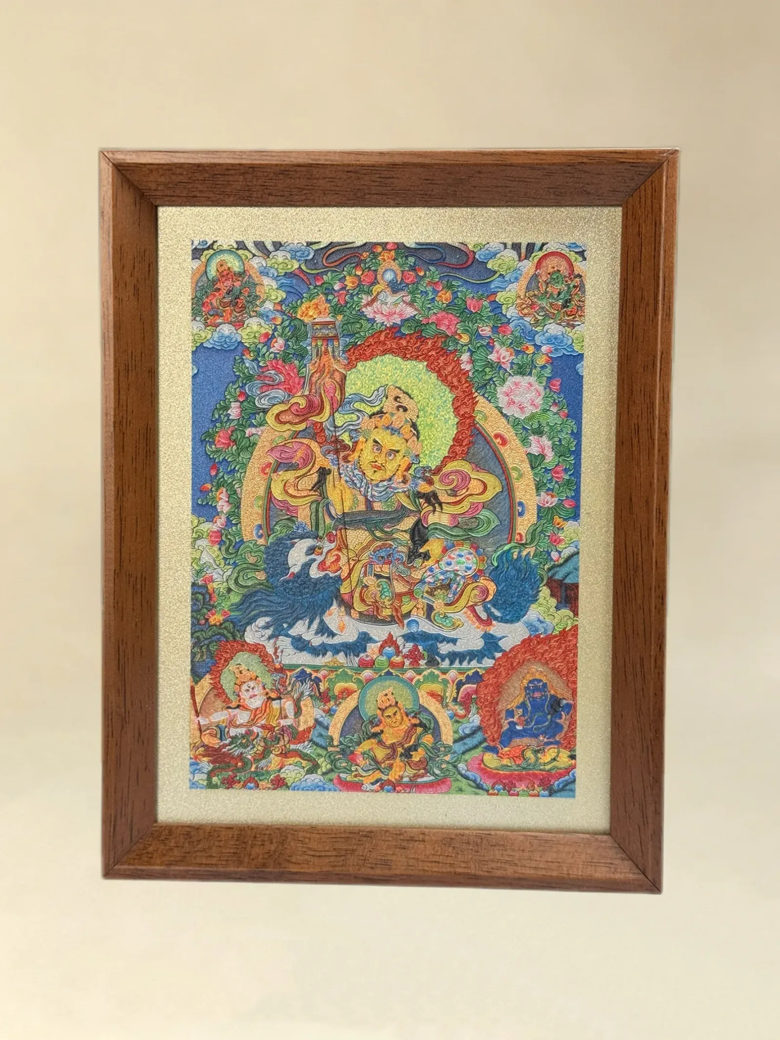 A relief artwork of Vaishravana, as a desktop frame, photographed front on.