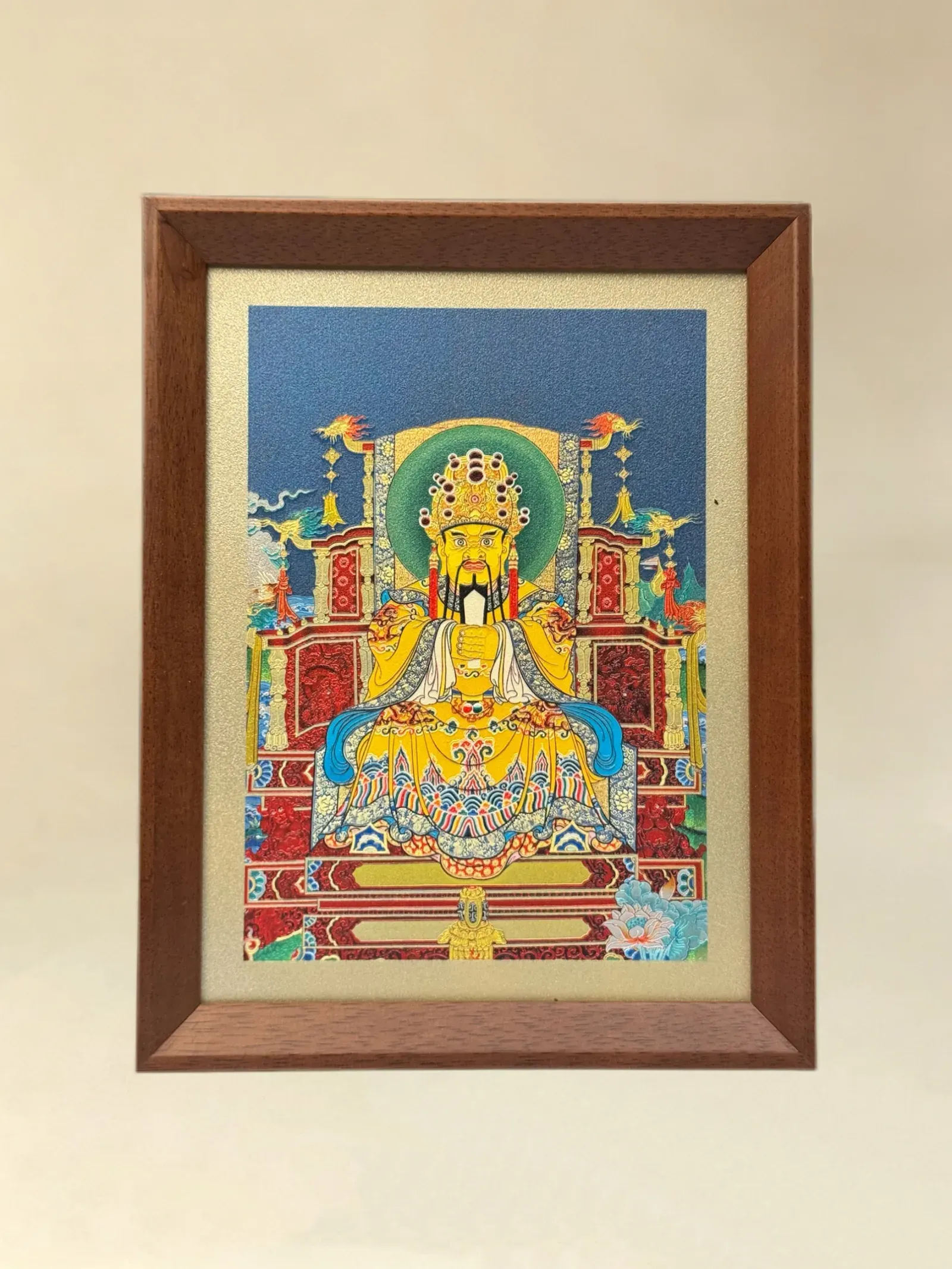 A relief artwork of Wuye, as a desktop frame, photographed front on.