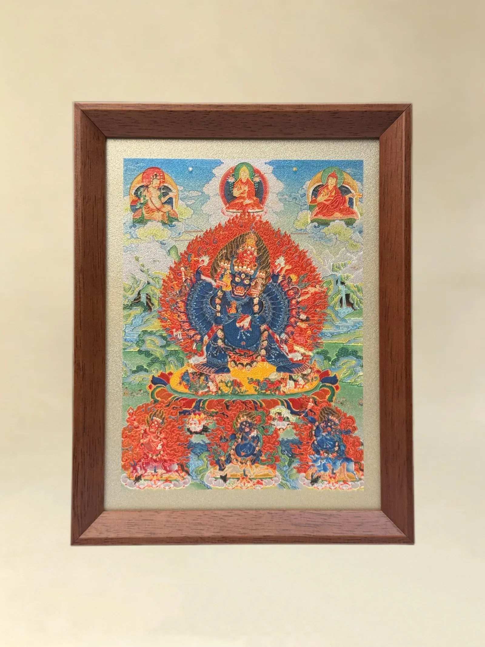 A relief artwork of Yamantaka, as a desktop frame, photographed front on.