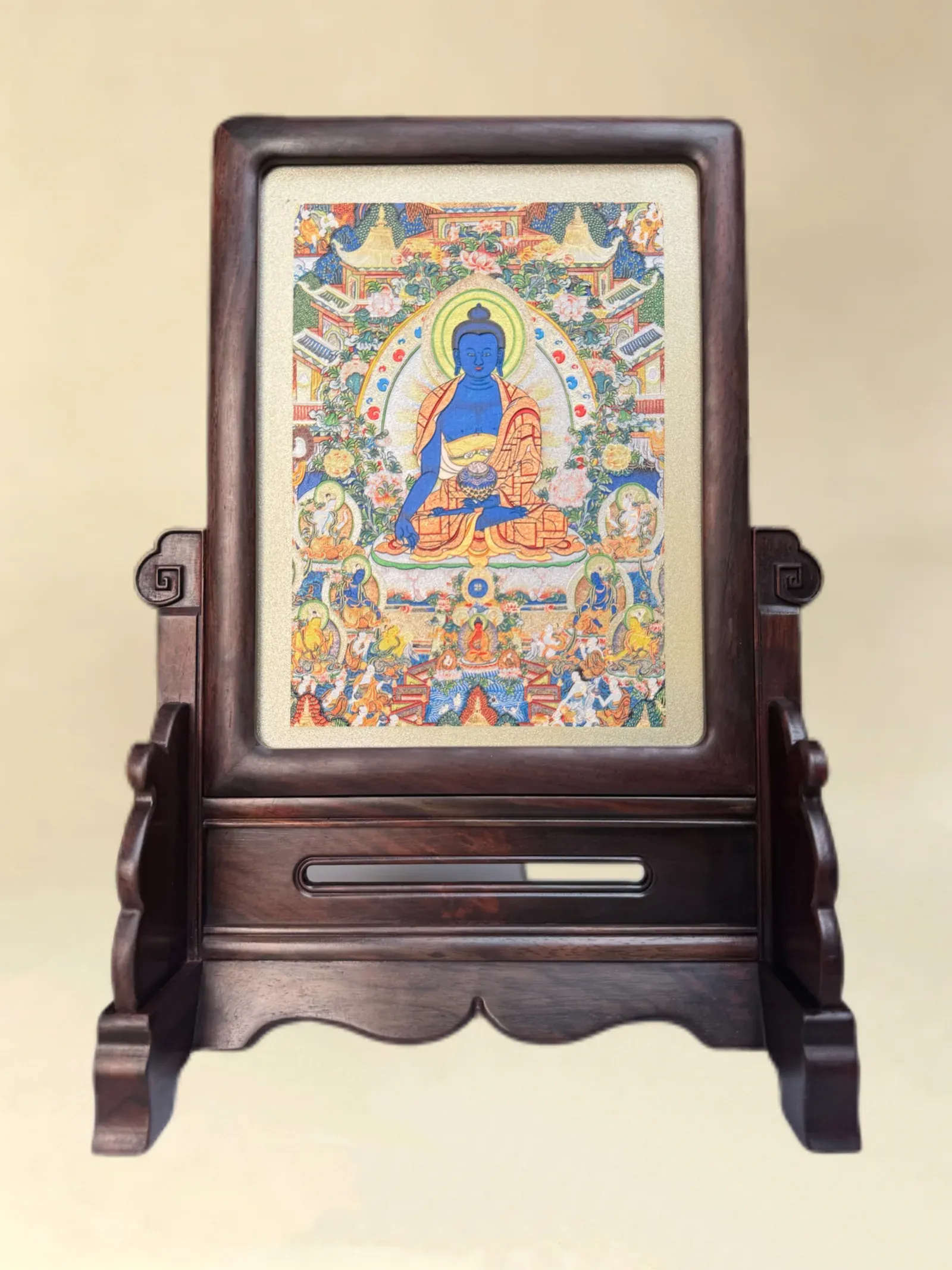 A relief artwork of Medicine Buddha, as a table screen, photographed front on.