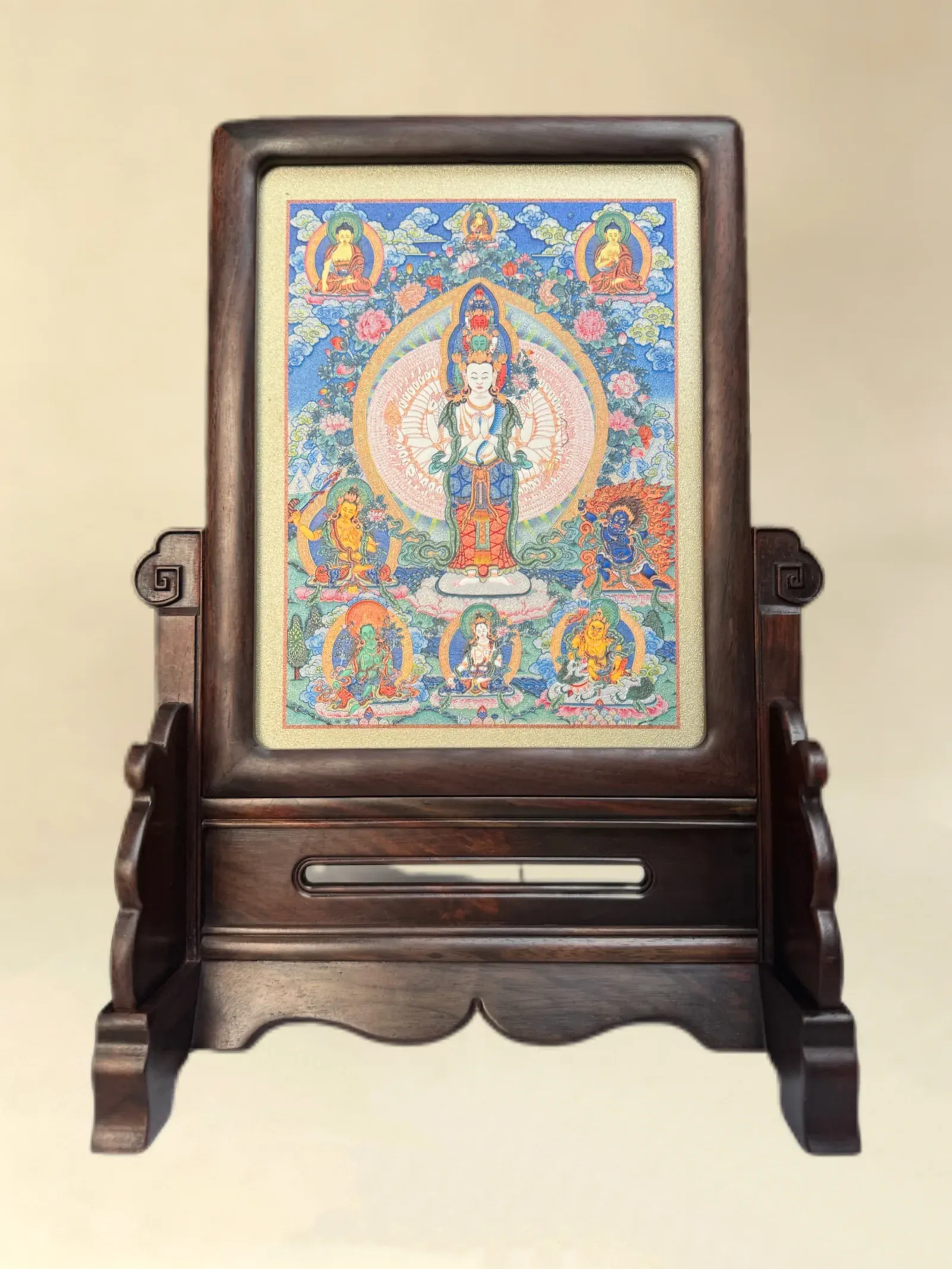 A relief artwork of Eleven-Headed Thousand-Armed Avalokiteshvara, as a table screen, photographed front on.