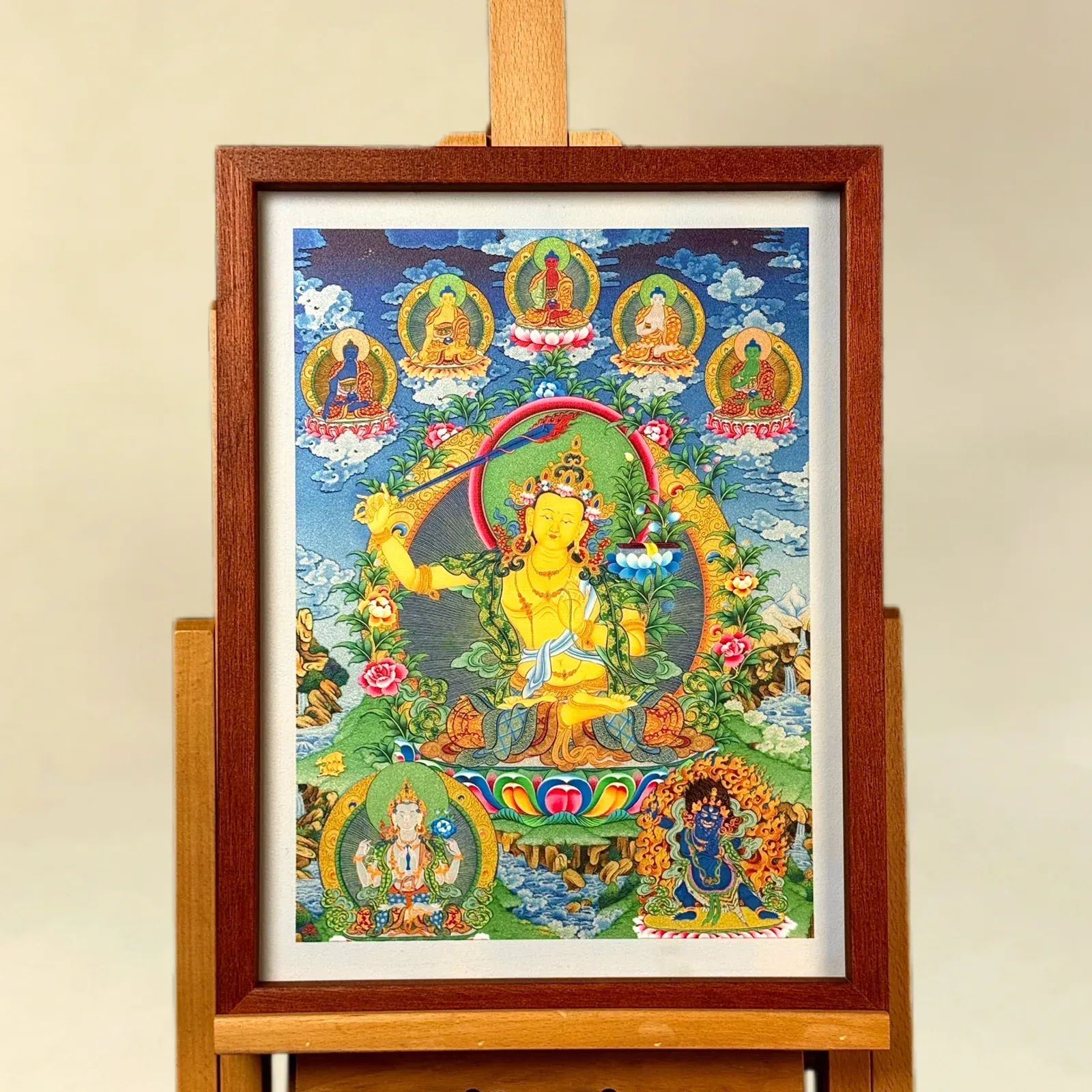 A relief artwork of Manjushri, as a wall piece, photographed front on.
