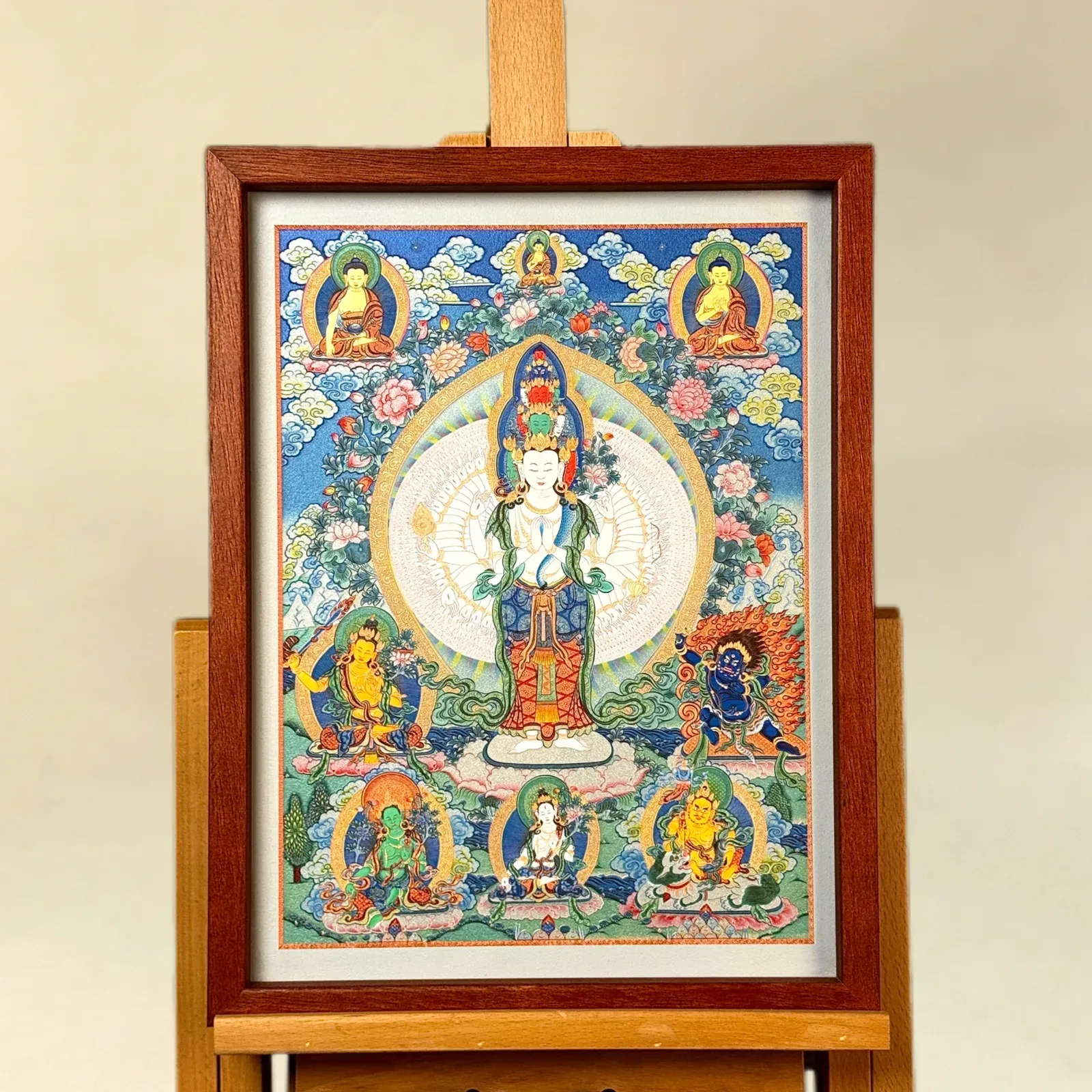 A relief artwork of Eleven-Headed Thousand-Armed Avalokiteshvara, as a wall piece, photographed front on.
